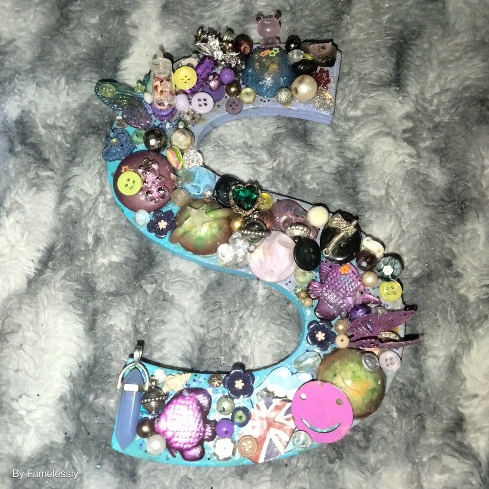 Teens bejeweled letter S